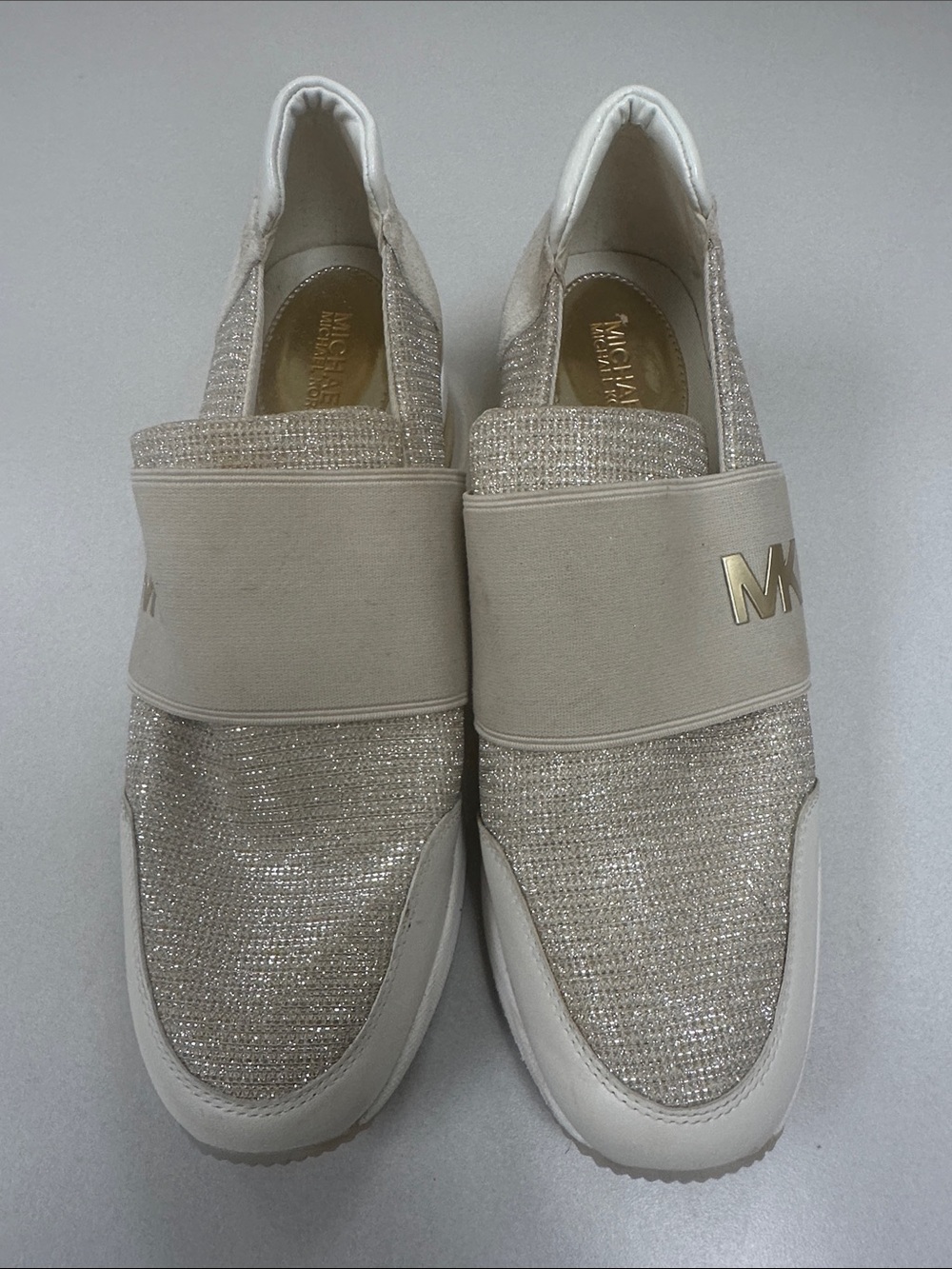 MICHAEL KORS Women’s Size 10 Felix wedge champagne gold slip on fashion sneakers